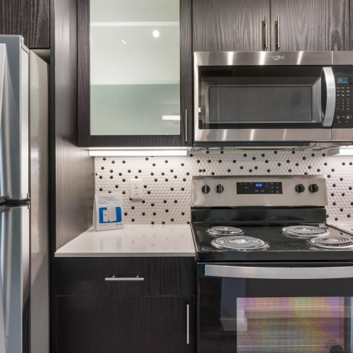 a kitchen with stainless steel appliances