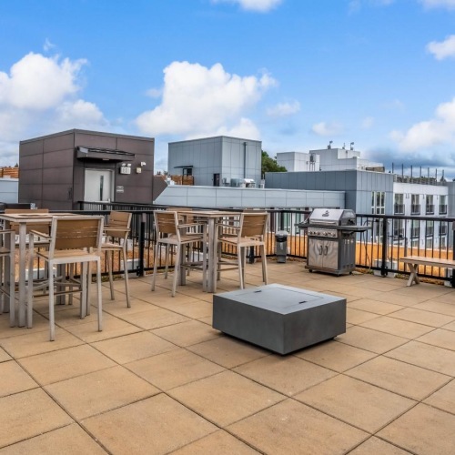 a group of tables and chairs outside